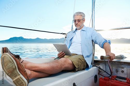 tablet computer on boat © Daxiao Productions