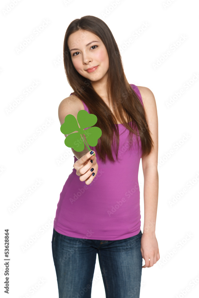 Young female giving you shamrock leaf