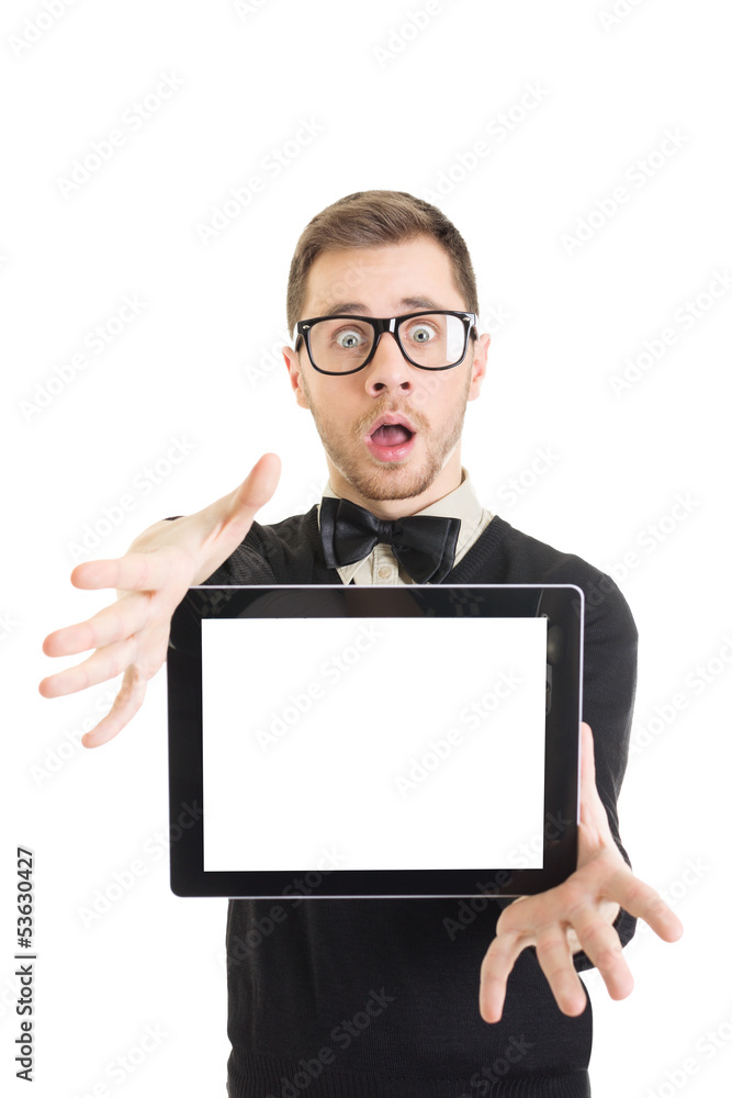 Shocked young nerd man showing blank tablet screen Shocked young nerd man showing blank tablet screen