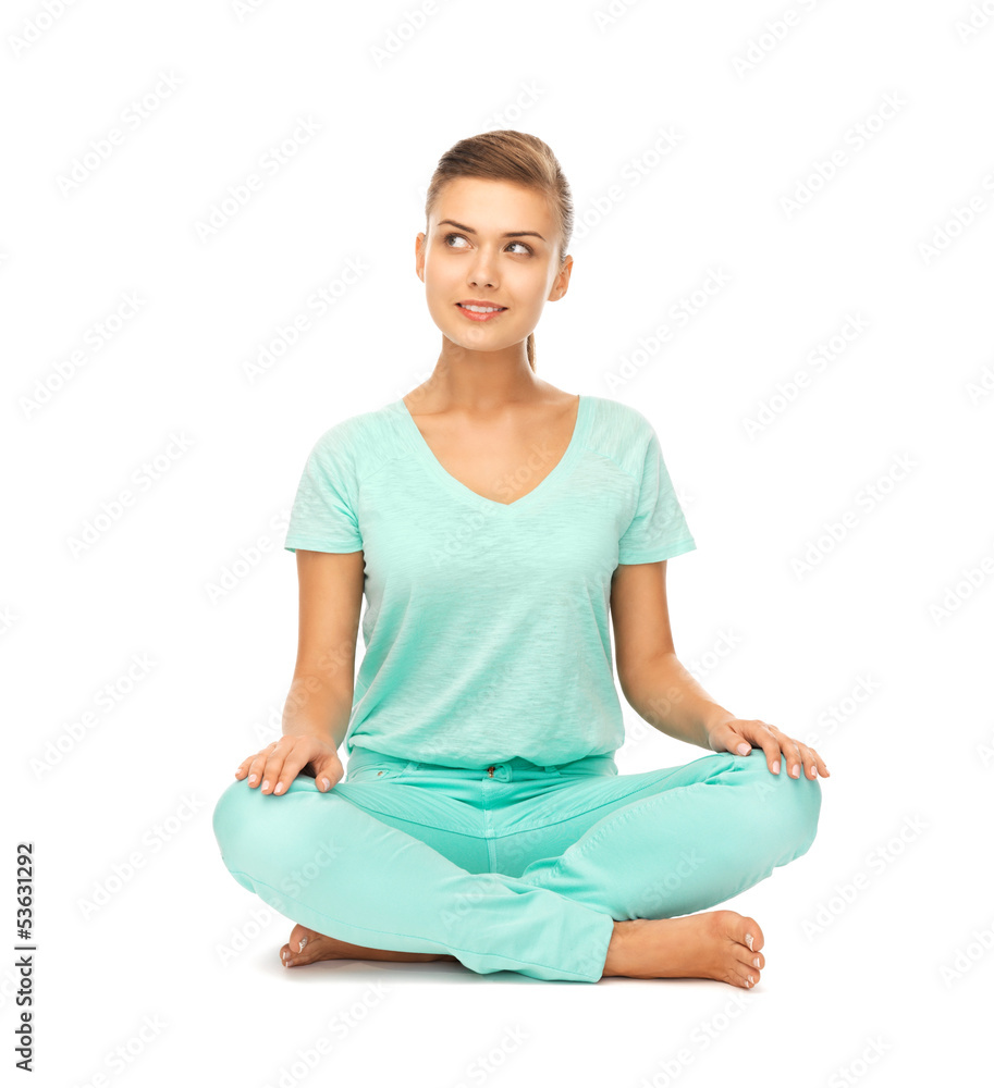 girl sitting in lotus position and meditating girl sitting in lotus position and meditating