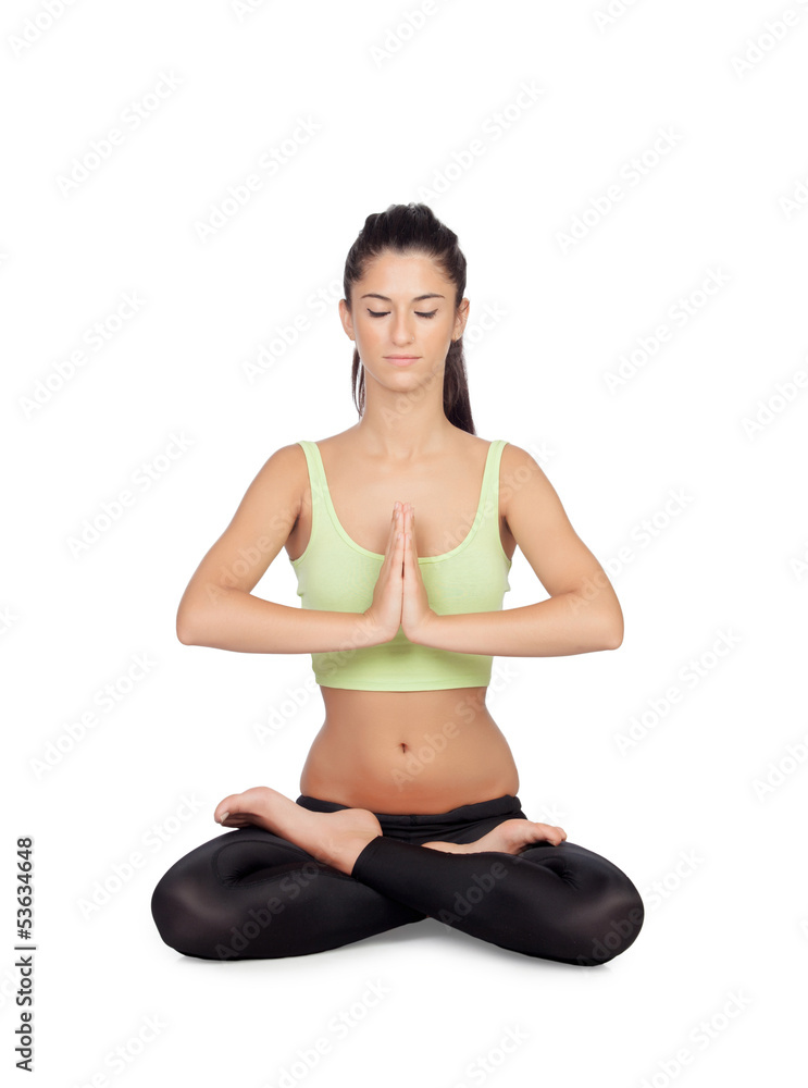 Young woman practicing yoga in the lotus position Young woman practicing yoga in the lotus position