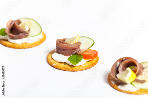 Canapes with pickled anchovy filet