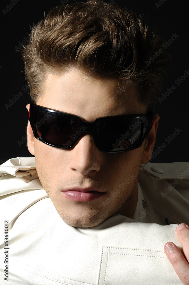 young man with sunglasses portrait young man with sunglasses portrait