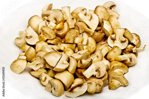 Button mushrooms on a white background