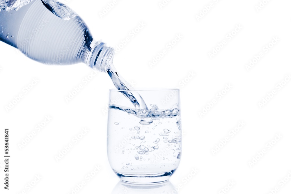 a glass with water trough little bottle and space for text a glass with water trough little bottle and space for text