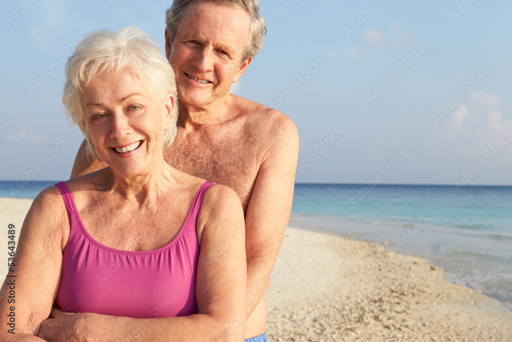 Portrait Of Senior Couple On Tropical Beach Holiday Portrait Of Senior Couple On Tropical Beach Holiday