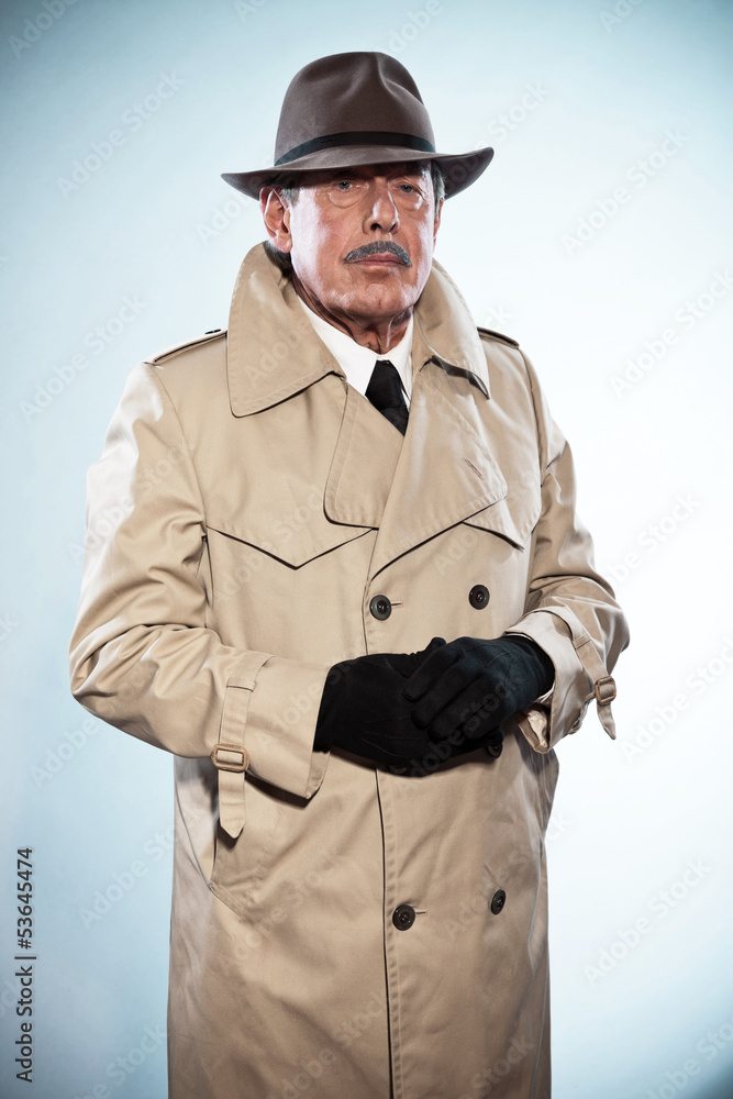 Retro detective man with mustache and hat. Wearing raincoat. Stu Retro detective man with mustache and hat. Wearing raincoat. Stu