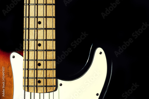 bass guitar on a black background