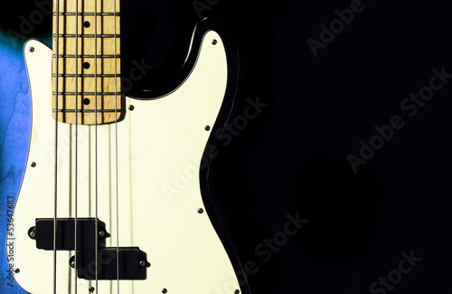 bass guitar on a black background