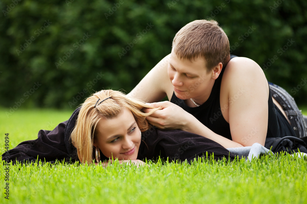 Happy young couple in a city park Happy young couple in a city park