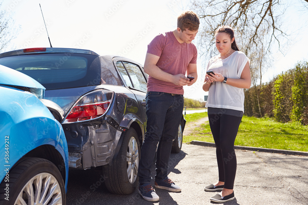 Two Drivers Exchange Insurance Details After Accident Two Drivers Exchange Insurance Details After Accident