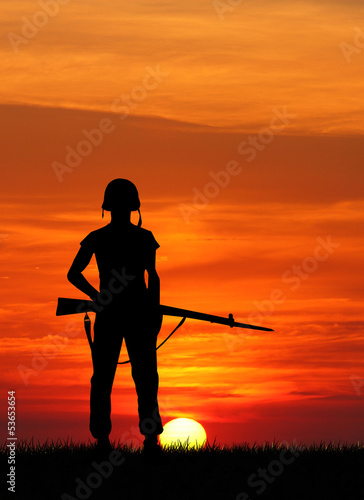 Soldiers silhouette at sunset