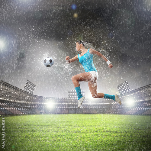 Young woman football player © Sergey Nivens