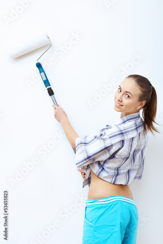 Woman with paint brushes