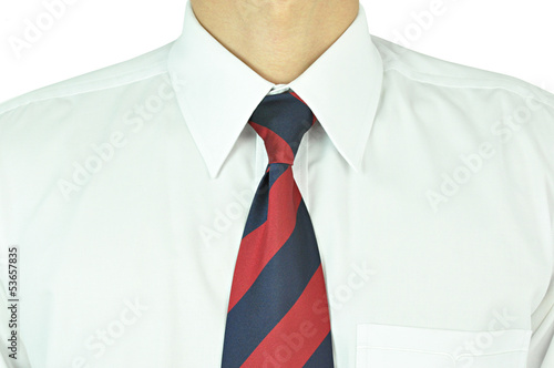 Man wearing white shirt with red-blue necktie