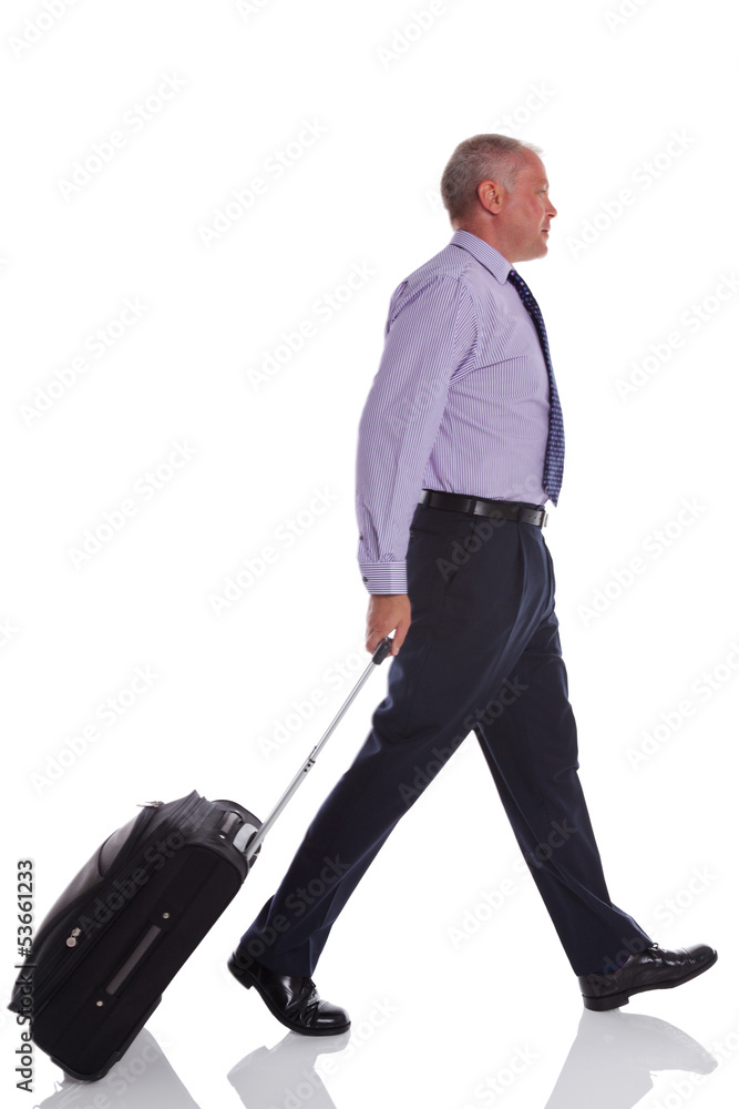 Businessman walking with travel suitcase. Businessman walking with travel suitcase.