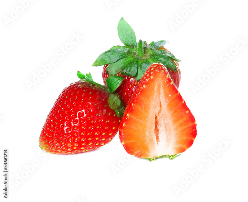 Strawberries with leaves, isolated on a white background.