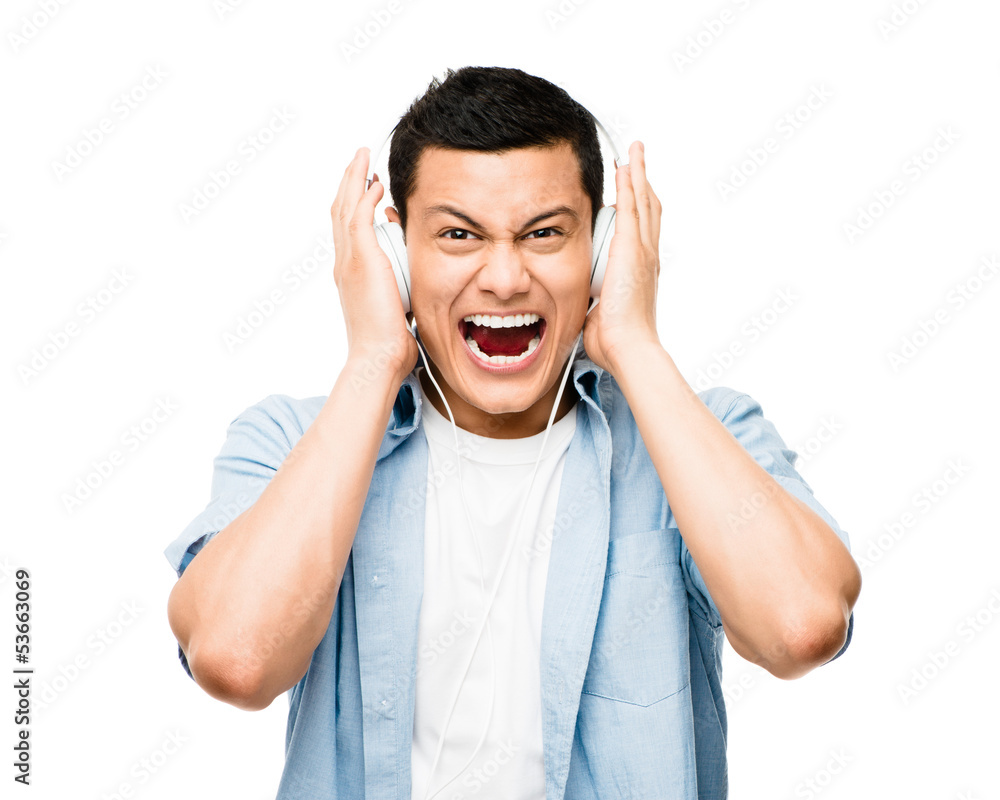 Naklejka premium Asian lsitening to music student heaphones white background