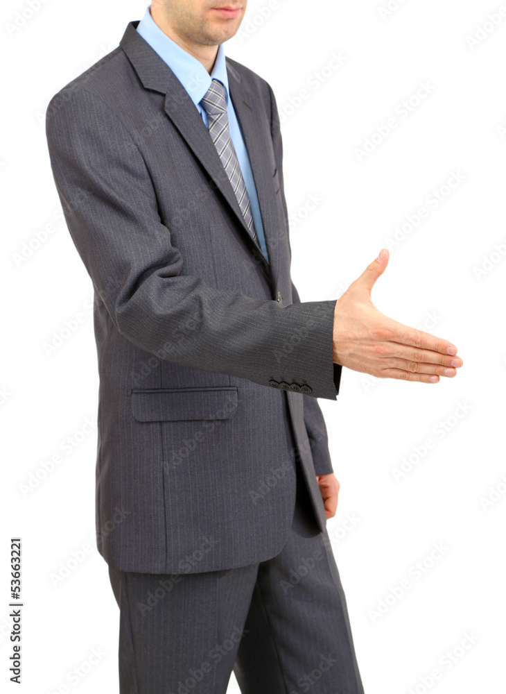 Yong businessman giving his hand for a handshake isolated Yong businessman giving his hand for a handshake isolated