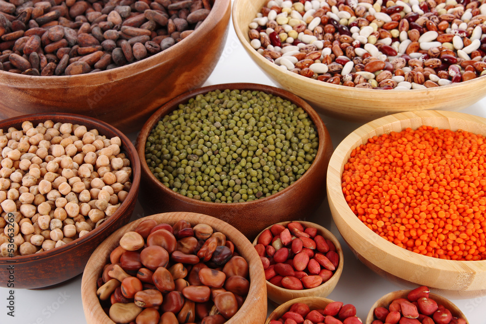 Different kinds of beans in bowls close-up Different kinds of beans in bowls close-up