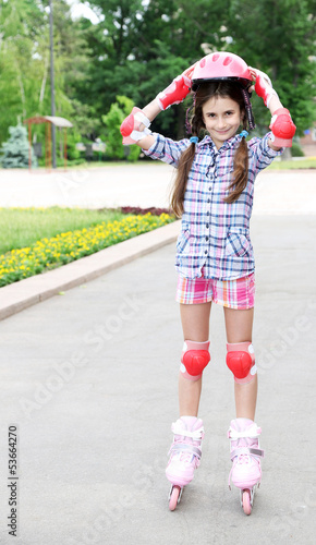 Little girl in roller skate...