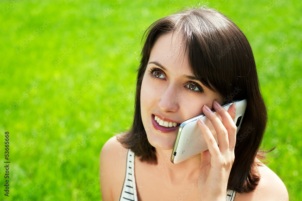 Happy Woman Talking on the Smart Phone Happy Woman Talking on the Smart Phone