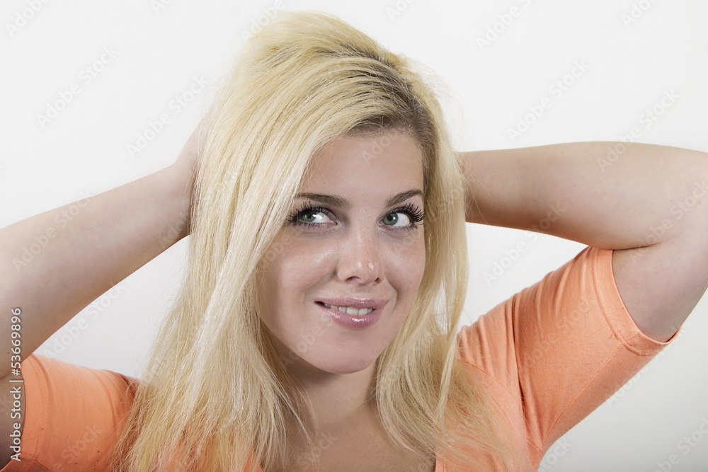 Fototapeta premium Portrait of a beautiful happy young blonde woman