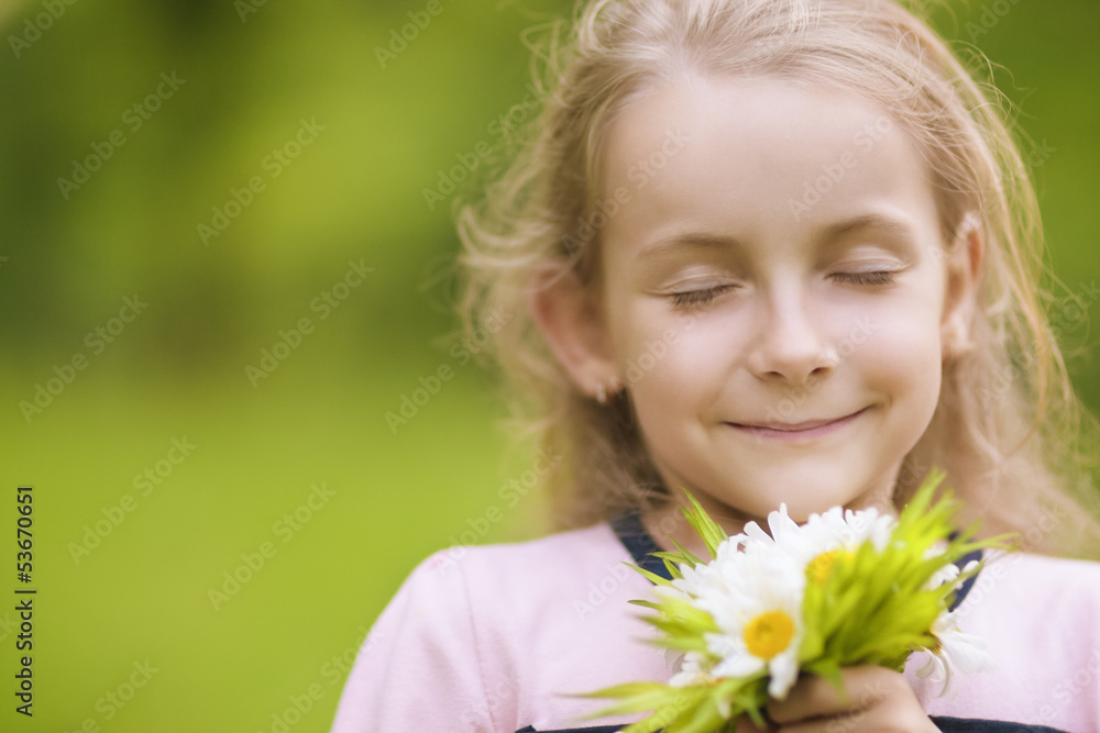 lovely little girl breathing flowers lovely little girl breathing flowers