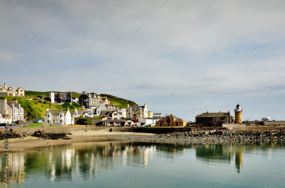 Portpatrick harbour lined with houses