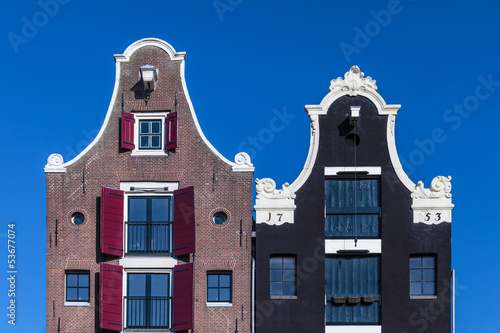 Photography Detail of two Dutch canal houses in Amsterdam