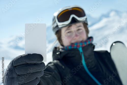 Winter sport atlethe showing lift pass © KonArt