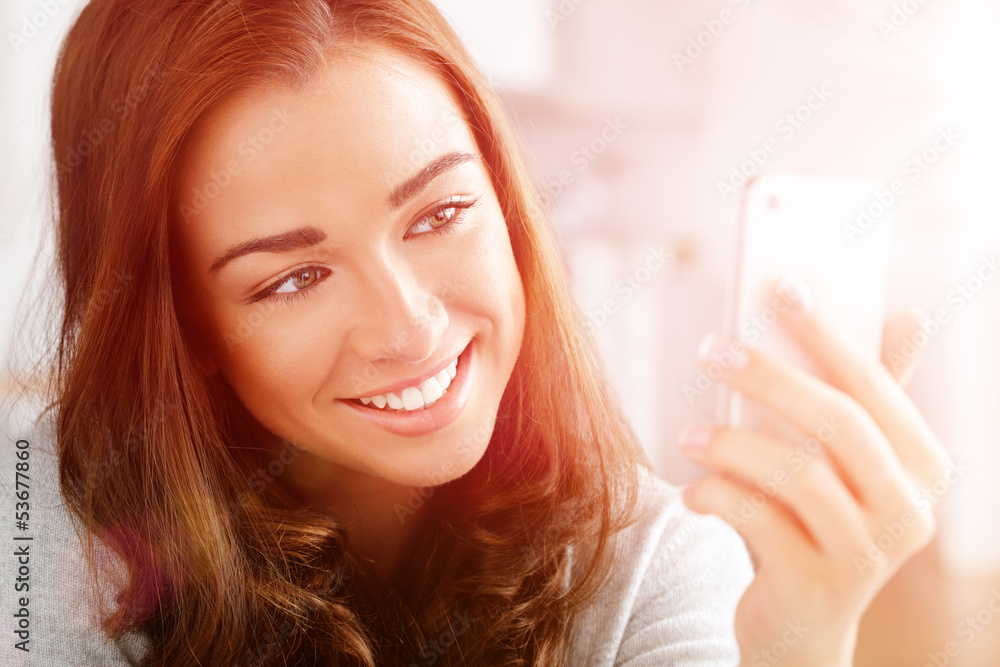 Pretty young woman using mobile phone Pretty young woman using mobile phone