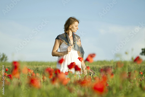 Wallpaper Mural Girl stands in poppy field Torontodigital.ca