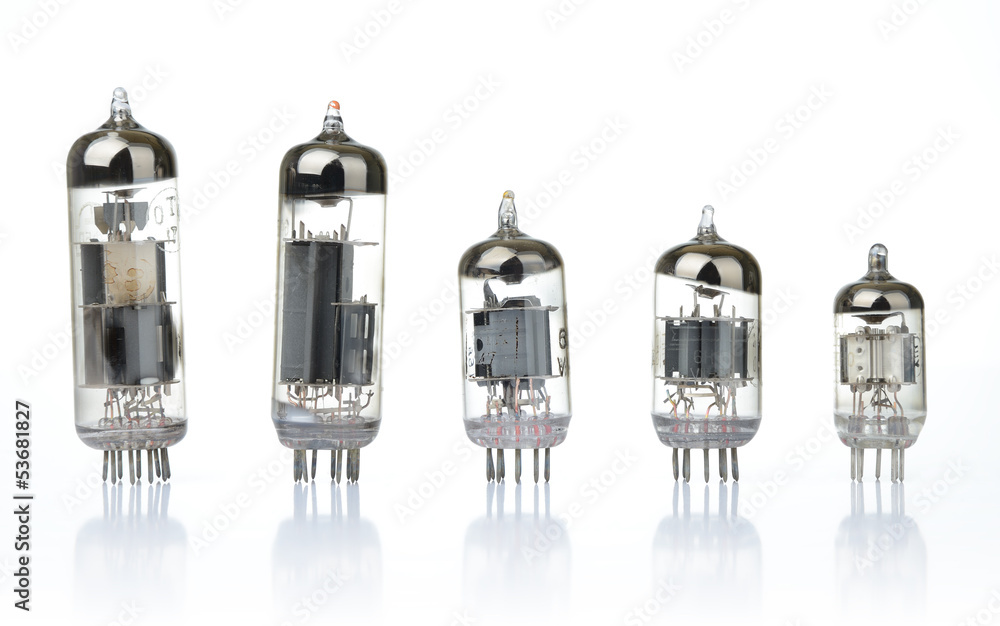 Old glass vacuum radio tubes on white background Old glass vacuum radio tubes on white background