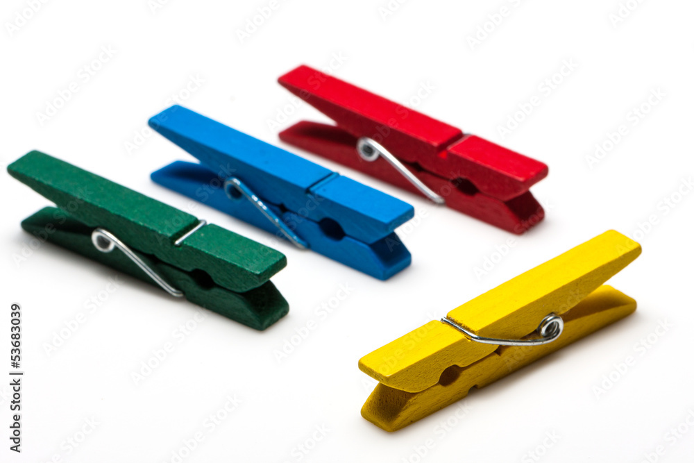 colorful wooden clothespins isolated on white background colorful wooden clothespins isolated on white background