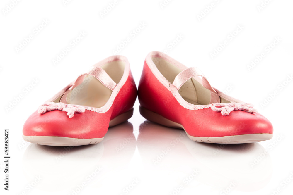 Naklejka premium red shoes on white background.