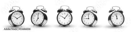 row of alarm clocks on white background