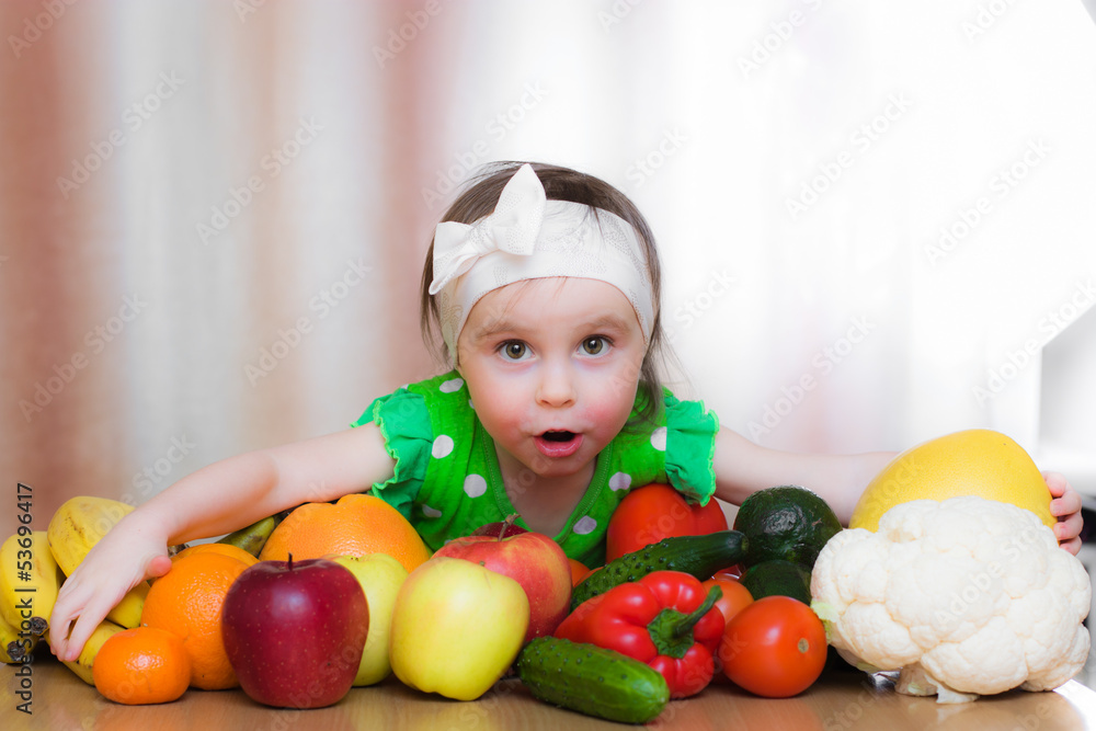 Happy Kid with vegetables and fruits. Happy Kid with vegetables and fruits.