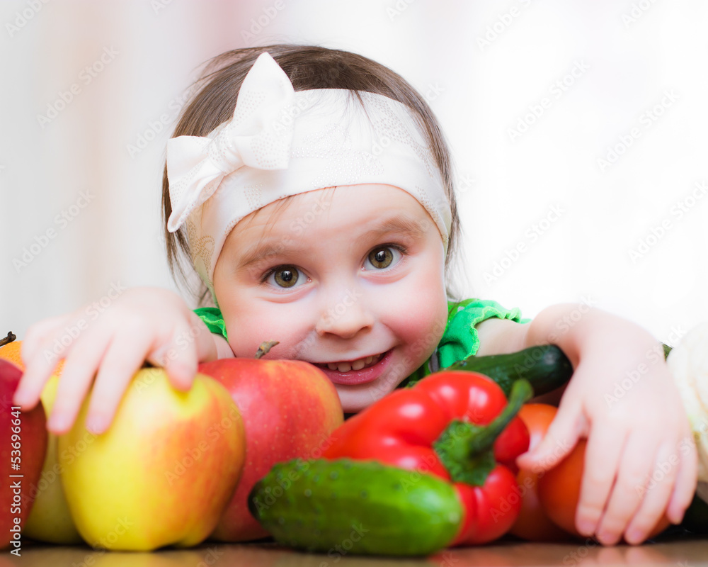 Happy Kid with vegetables and fruits. Happy Kid with vegetables and fruits.