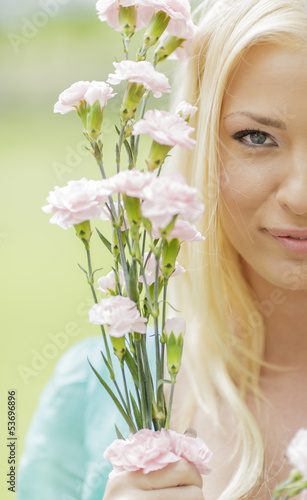 Young woman with flowers