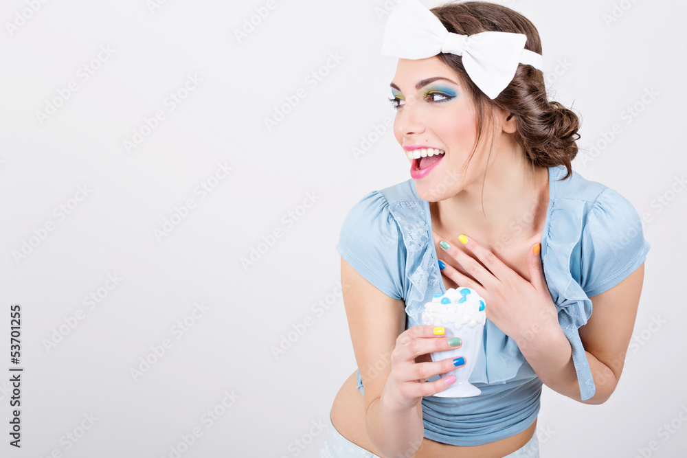 Surprised retro young woman in blue holding ice-cream Surprised retro young woman in blue holding ice-cream