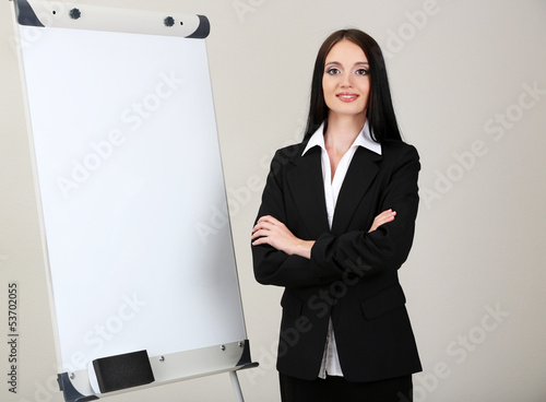 Businesswoman presenting on...