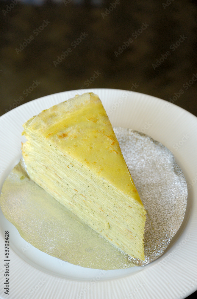 Vanilla crepe cake in white dish