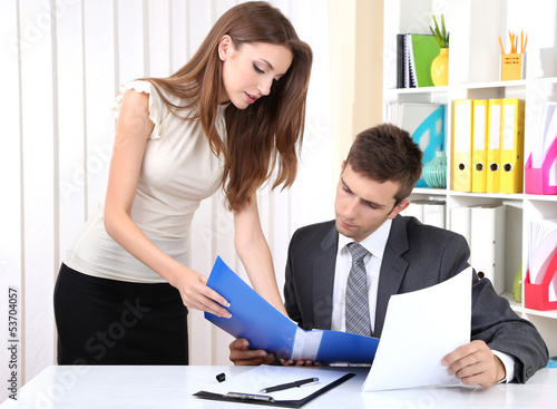 Business colleagues working...