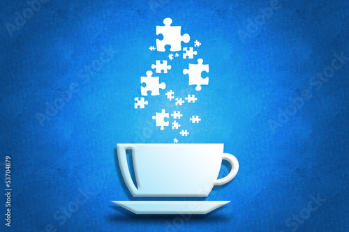 Business creativity concept: Coffee cup with puzzle pieces