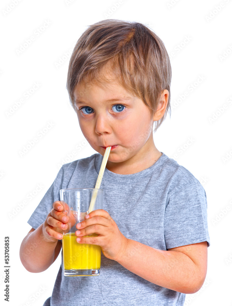 Little boy drinking orange juice Little boy drinking orange juice