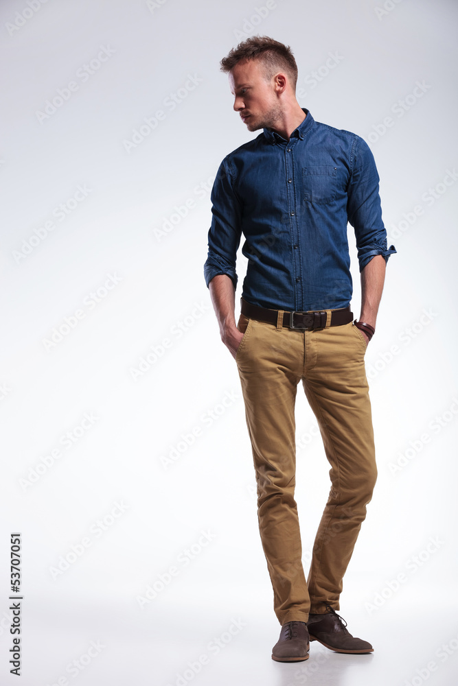 Fototapeta premium casual man standing with both hands in pockets