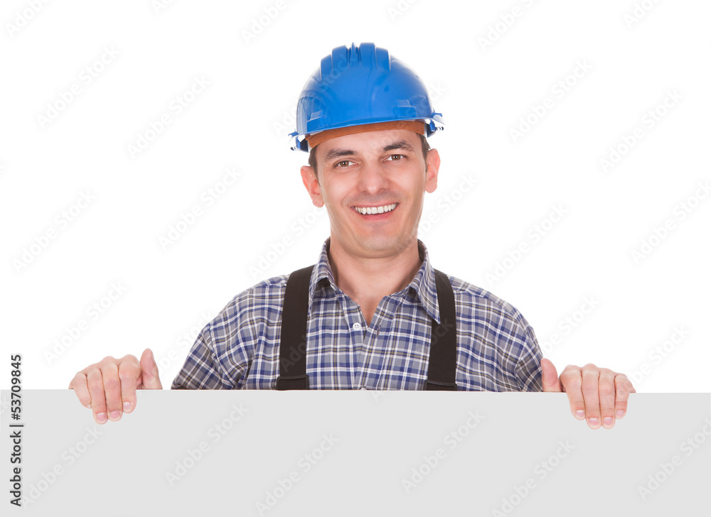 Portrait Of Male Worker With Placard Portrait Of Male Worker With Placard