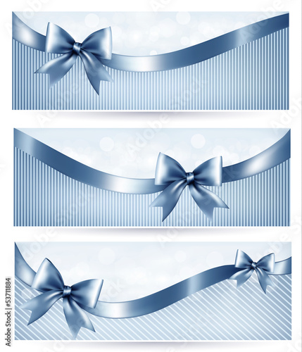 Set of blue holiday banners with gift glossy bow and ribbons.