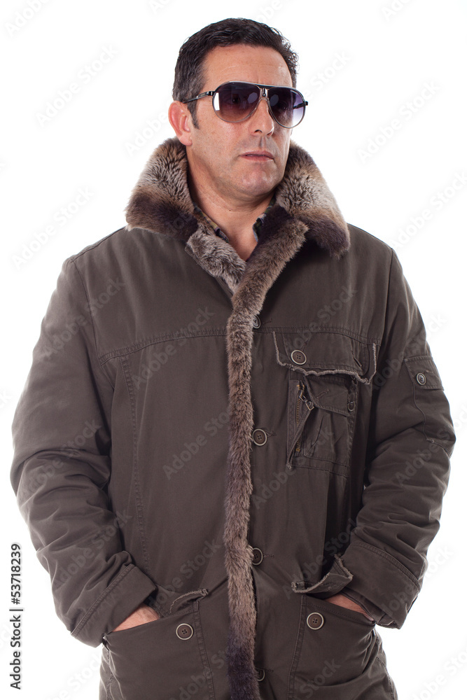 Obraz premium Somber tough guy and black sunglasses, looking at camera.